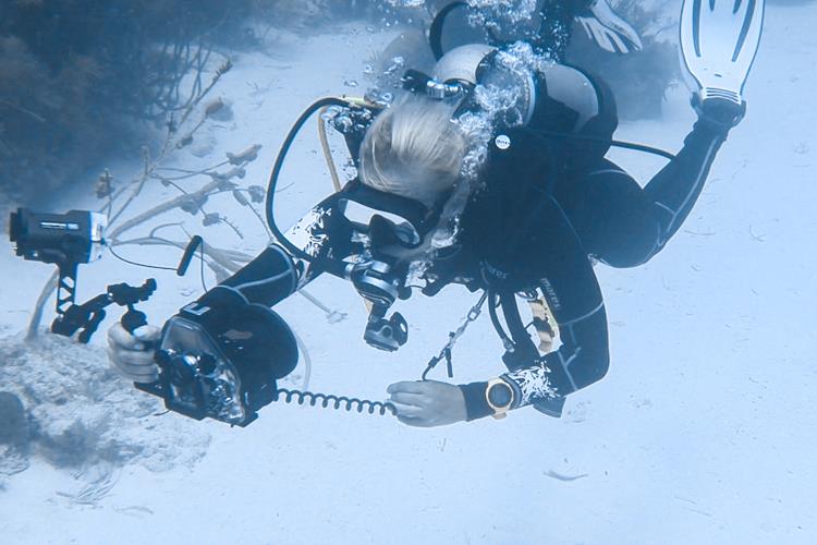 Stephanie using underwater camera in the keys.