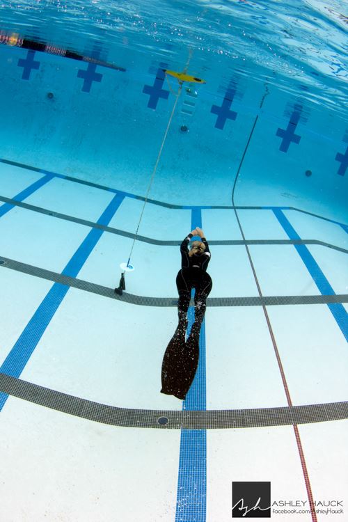 Margo swimming in San Diego freediving pool.